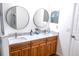 Bathroom vanity with double sinks, marble countertops, and modern fixtures at 2341 Stone Cross Cir, Orlando, FL 32828