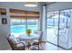 Sunny breakfast nook with views of the pool area, ideal for casual dining at 2341 Stone Cross Cir, Orlando, FL 32828