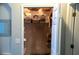 Walk-in closet with shelves and storage solutions for organization at 2341 Stone Cross Cir, Orlando, FL 32828
