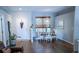 Cozy dining nook featuring tile flooring and a view of the front yard at 2341 Stone Cross Cir, Orlando, FL 32828