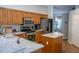 Modern kitchen with stainless steel appliances, ample storage, and a breakfast nook nearby at 2341 Stone Cross Cir, Orlando, FL 32828