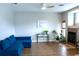 Bright living room with fireplace, ceiling fan, plants, and modern decor at 2341 Stone Cross Cir, Orlando, FL 32828