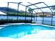 Sparkling private pool with screened enclosure and lush landscaping at 2341 Stone Cross Cir, Orlando, FL 32828