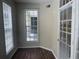 Sunny bonus room offers ample natural light from the windows, and features wood-look flooring at 239 Longview Ave # 107, Celebration, FL 34747