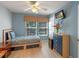 Bright bedroom with a twin bed, TV, and blue walls, offering a comfortable and inviting space at 3015 Yellow Lantana Ln, Kissimmee, FL 34747