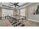 A large conference room features ample seating, neutral decor and modern lighting at 3015 Yellow Lantana Ln, Kissimmee, FL 34747