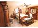 Spacious bedroom with ample storage, a ceiling fan, and traditional furnishings at 3661 Se 131St Pl, Belleview, FL 34420