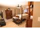 This bedroom has a traditional style and has a ceiling fan to keep you cool at 3661 Se 131St Pl, Belleview, FL 34420
