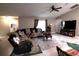 Spacious living room boasts a vaulted ceiling, tile floors, and lots of natural light at 3661 Se 131St Pl, Belleview, FL 34420