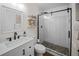 Modern bathroom with a stylish vanity, glass shower, and decorative shelving for a clean, updated look at 3738 Crossing Creek Blvd, St Cloud, FL 34772