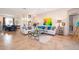 Bright living room with tile flooring, neutral decor, and an open layout at 389 Yellow Snapdragon Dr, Davenport, FL 33837