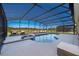 Relaxing screened pool area with lounge chairs, perfect for enjoying sunny days outdoors at 389 Yellow Snapdragon Dr, Davenport, FL 33837