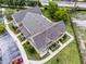 Aerial view of a townhome complex with well-maintained landscaping and parking at 4551 Jonafree Ln # 103, Kissimmee, FL 34746