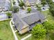 Bird's-eye view of the complex, showcasing manicured lawns, paved walkways, and ample parking at 4551 Jonafree Ln # 103, Kissimmee, FL 34746