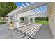 Community car wash station featuring a vacuum under a pergola, with playground and tennis court nearby at 4551 Jonafree Ln # 103, Kissimmee, FL 34746