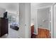 Hallway leading to a coastal themed bedroom with a connecting bathroom at 4551 Jonafree Ln # 103, Kissimmee, FL 34746
