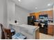 Well-maintained kitchen with a breakfast bar and black appliances at 4551 Jonafree Ln # 103, Kissimmee, FL 34746
