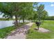 Enjoy the lake view and barbecue from the grill and picnic area at 4551 Jonafree Ln # 103, Kissimmee, FL 34746