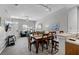 Open concept with dining room and living room area with comfortable seating and lots of light at 4551 Jonafree Ln # 103, Kissimmee, FL 34746