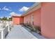 Charming exterior with well-maintained landscaping, showcasing the house's curb appeal at 572 Floral Dr, Kissimmee, FL 34743