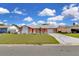 Charming single-Gathering home with a well-manicured front yard and a welcoming curb appeal at 572 Floral Dr, Kissimmee, FL 34743