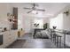 A cozy bedroom featuring a bed and a bar, plus a kitchen for added convenience at 673 E Church Ave, Longwood, FL 32750