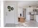 Bright kitchen with stainless steel appliances, lots of counter space, and a dining area at 673 E Church Ave, Longwood, FL 32750