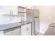 Stylish kitchen featuring sleek stainless steel appliances and modern finishes at 673 E Church Ave, Longwood, FL 32750