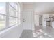 Bright living room featuring laminate floors with natural light and an open floor plan at 673 E Church Ave, Longwood, FL 32750