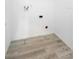 A utility room with modern flooring and simple, clean lines at 707 Stonewyk Way, Kissimmee, FL 34744