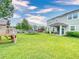Spacious backyard featuring a wooden playset at 8635 Tallfield Ave, Orlando, FL 32832