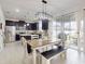 Dining area open to kitchen with slider door access to outdoor patio at 8635 Tallfield Ave, Orlando, FL 32832