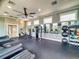 Well-equipped gym with treadmills, weights, and mirrors; a spacious area for fitness enthusiasts to achieve their goals at 8635 Tallfield Ave, Orlando, FL 32832