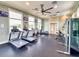 Modern gym featuring treadmills, stationary bikes, and weight machines, offering a complete fitness experience for residents at 8635 Tallfield Ave, Orlando, FL 32832