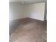 Spacious living room featuring neutral paint and carpet, perfect for entertaining or relaxing at 1895 Hickory Bluff Rd, Kissimmee, FL 34744