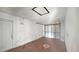 An empty two car garage awaits your customization and design ideas with its spacious floor plan at 1013 Carefree Cove Dr, Winter Haven, FL 33881