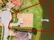 Aerial view showcases the home's expansive lot and waterfront access, featuring a private boat dock at 1110 Terralago Way, Kissimmee, FL 34746