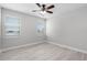 Bright bedroom filled with natural light, featuring modern windows and flooring at 1110 Terralago Way, Kissimmee, FL 34746