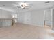 Spacious bonus room area with wood floors and natural light at 1110 Terralago Way, Kissimmee, FL 34746