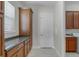 Storage area with ample cabinet space and granite countertops at 1110 Terralago Way, Kissimmee, FL 34746