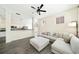 Spacious living room featuring an open concept, a large sectional couch, hardwood floors, and natural light at 121 Longview Ave, Celebration, FL 34747