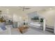 Open-concept living space combining the kitchen, dining area, and living room at 1219 Lido Dr, Howey In The Hills, FL 34737