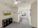 Office with a TV, a computer desk, and a decorative black shelf at 1219 Lido Dr, Howey In The Hills, FL 34737