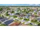 Aerial view shows well-maintained homes with mature trees in quiet neighborhood at 12445 Bohannon Blvd, Orlando, FL 32824