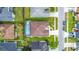 Aerial view of the property showcasing the pool, backyard, and surrounding neighborhood at 12445 Bohannon Blvd, Orlando, FL 32824