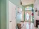 Welcoming foyer with natural light, beautiful tile floors, and convenient bench seating area at 12445 Bohannon Blvd, Orlando, FL 32824