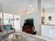 Open-concept living area with tile flooring, modern furnishings and natural light at 12445 Bohannon Blvd, Orlando, FL 32824