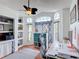Bright home office with built-in shelves and ample workspace at 12445 Bohannon Blvd, Orlando, FL 32824