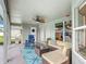Cozy covered patio with comfortable seating and a view of the backyard at 12445 Bohannon Blvd, Orlando, FL 32824