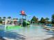 Gathering-friendly splash pad with slides, water features and plenty of seating at 1614 Lima Ave, Kissimmee, FL 34747